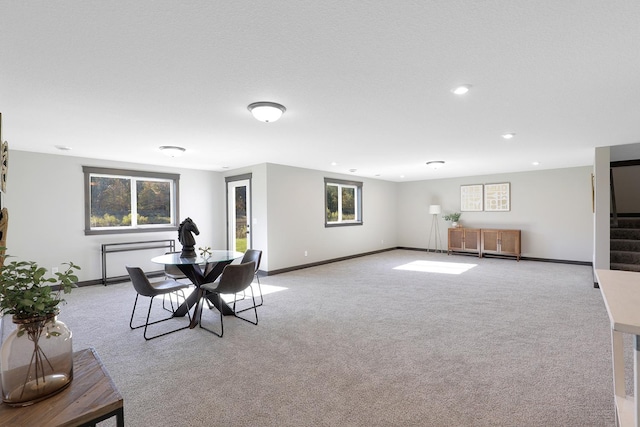 view of carpeted dining area