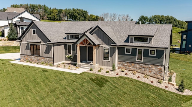 view of front of home featuring a porch and a front lawn