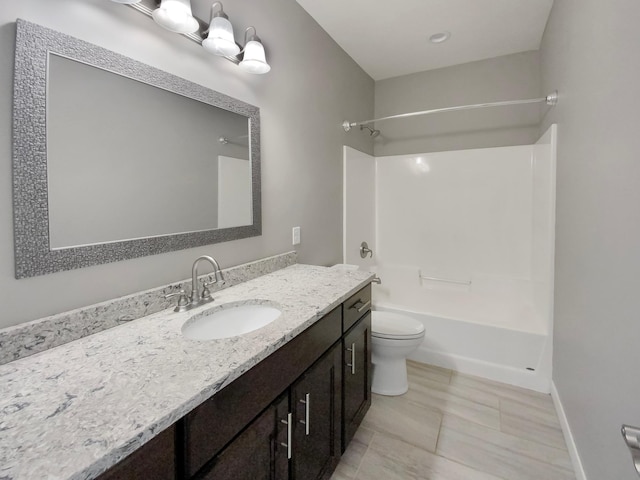 full bathroom featuring tile patterned floors, vanity, shower / bath combination, and toilet