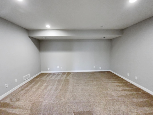 empty room with carpet flooring