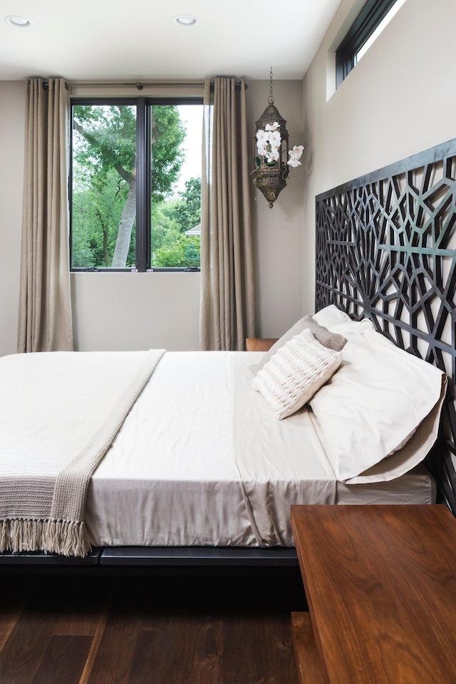 bedroom featuring recessed lighting and wood finished floors