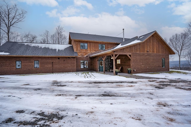 view of snow covered property