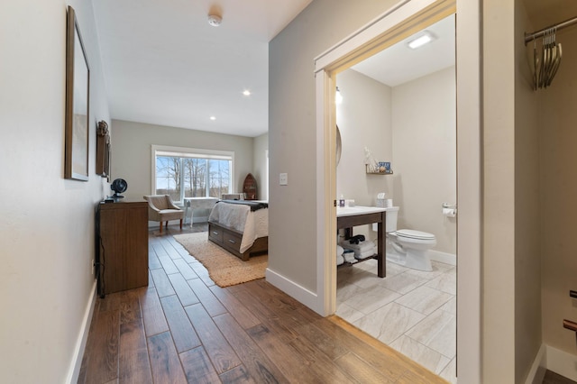 hallway featuring hardwood / wood-style flooring