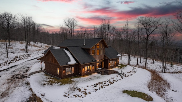 view of snow covered property