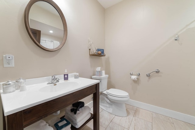 bathroom with toilet and sink