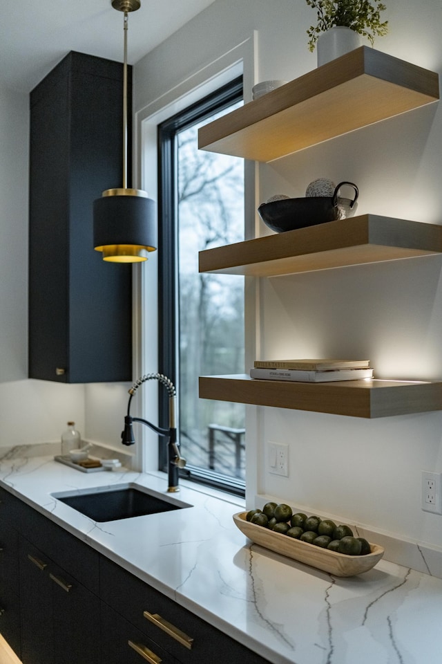 4163 Christopherson Ln SW, Rochester, MN 55902 - kitchen featuring dark cabinetry, a sink, and open shelves
