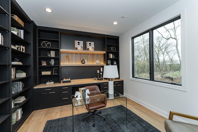 4163 Christopherson Ln SW, Rochester, MN 55902 - office featuring baseboards, light wood finished floors, recessed lighting, and built in desk