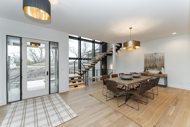 4163 Christopherson Ln SW, Rochester, MN 55902 - dining room featuring stairway, light wood-style floors, baseboards, and recessed lighting