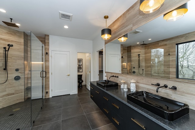 4163 Christopherson Ln SW, Rochester, MN 55902 - full bath with a shower stall, tile patterned flooring, double vanity, recessed lighting, and backsplash