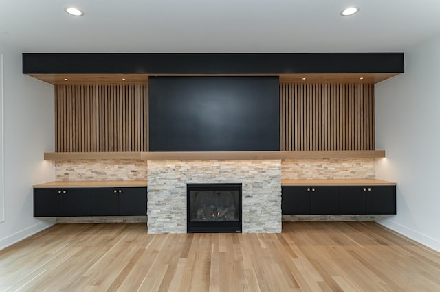 4163 Christopherson Ln SW, Rochester, MN 55902 - detailed view of wood finished floors, baseboards, and recessed lighting