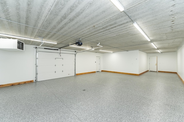 4163 Christopherson Ln SW, Rochester, MN 55902 - garage with a garage door opener and baseboards
