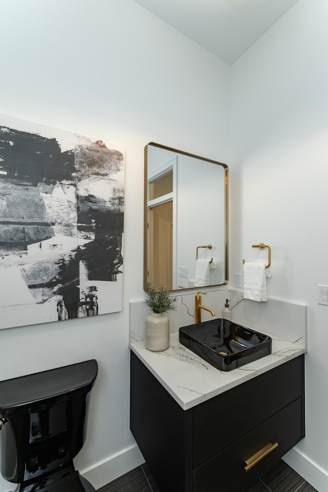 4163 Christopherson Ln SW, Rochester, MN 55902 - bathroom with baseboards and vanity