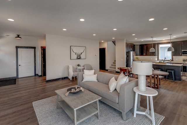 living room featuring dark hardwood / wood-style floors