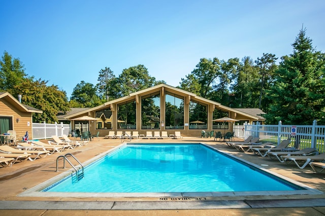 view of pool featuring a patio area