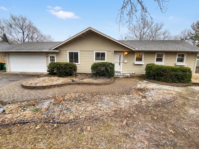 ranch-style house featuring a garage