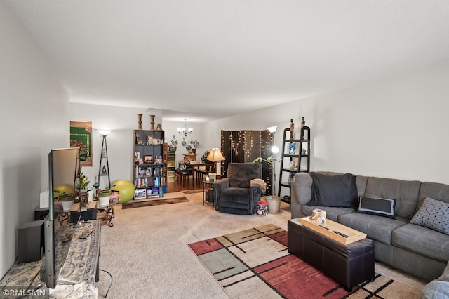 living room featuring light colored carpet and a chandelier