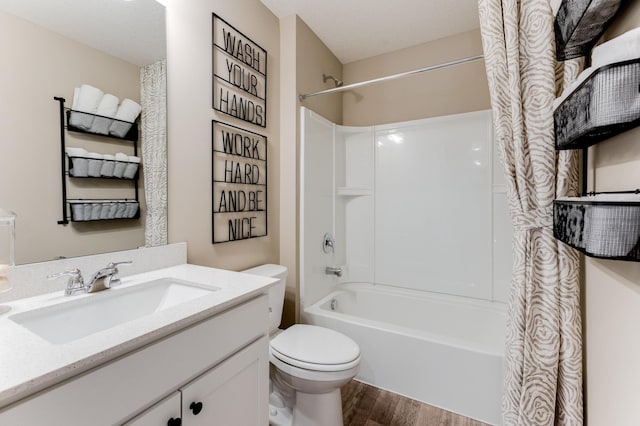 full bathroom with oversized vanity, toilet, shower / bath combo with shower curtain, and wood-type flooring