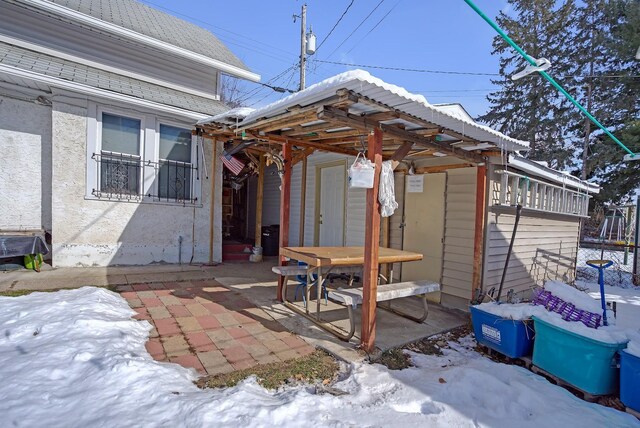 view of snow covered patio