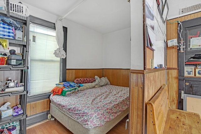 bedroom with light wood-type flooring