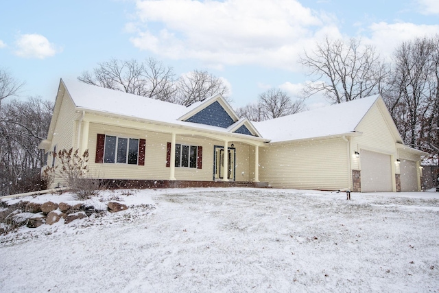 view of front of property featuring a garage