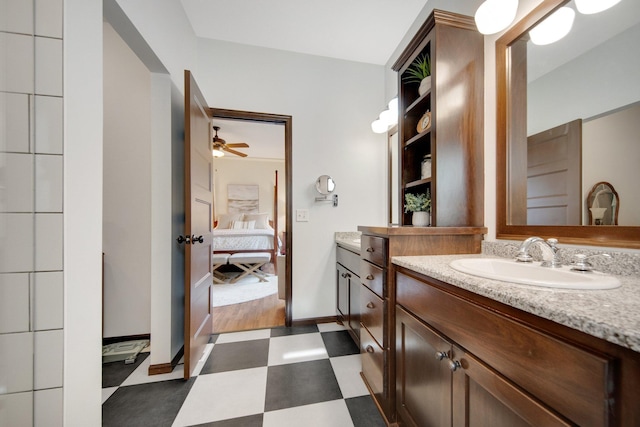 bathroom featuring vanity and ceiling fan