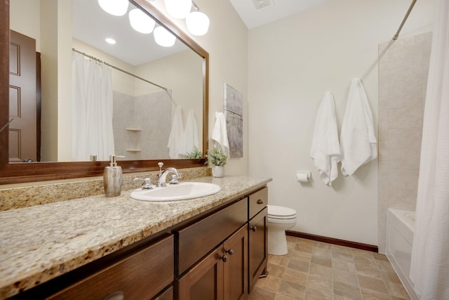 full bathroom with shower / bath combo with shower curtain, vanity, and toilet