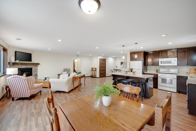 dining room with light hardwood / wood-style flooring