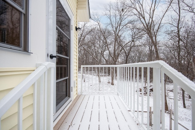 view of snow covered deck