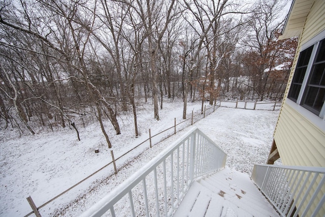 view of snow covered deck