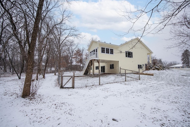 view of snow covered property