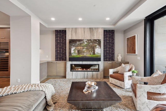 living room with a large fireplace