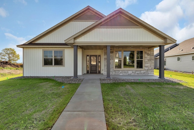 view of front facade with a porch and a front yard