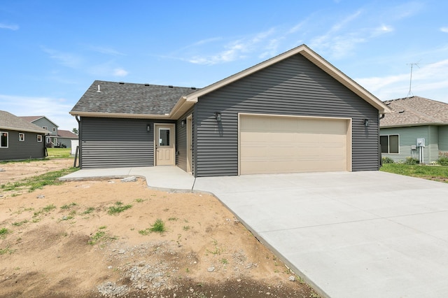 ranch-style home with a garage