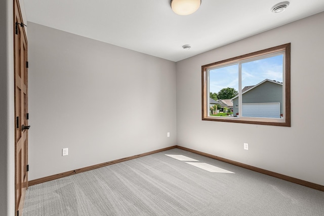 empty room with carpet flooring