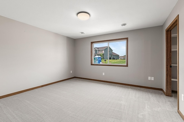 unfurnished room with carpet