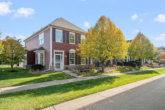 view of front facade featuring a front yard