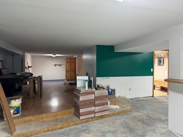 interior space featuring a textured ceiling