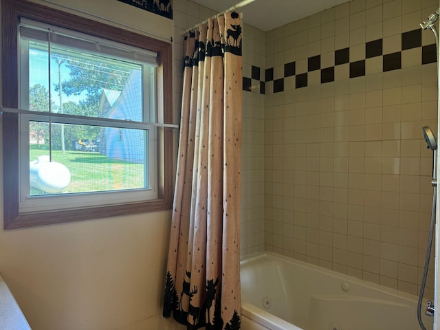 full bath featuring a combined bath / shower with jetted tub