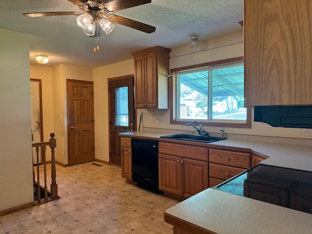 kitchen featuring electric stove, a sink, light countertops, light floors, and dishwasher