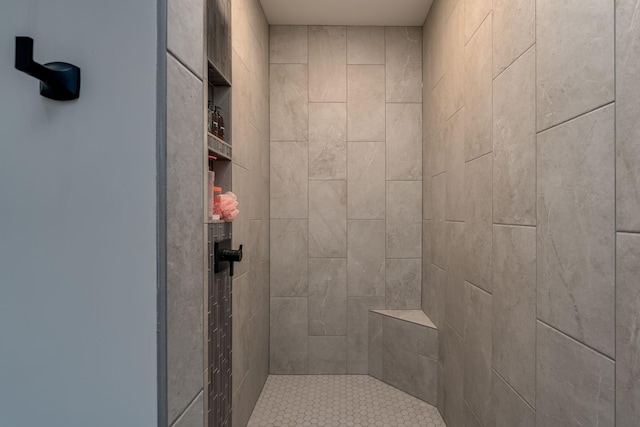 bathroom featuring tiled shower