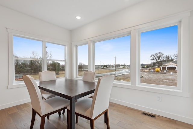 dining room featuring light wood-type flooring