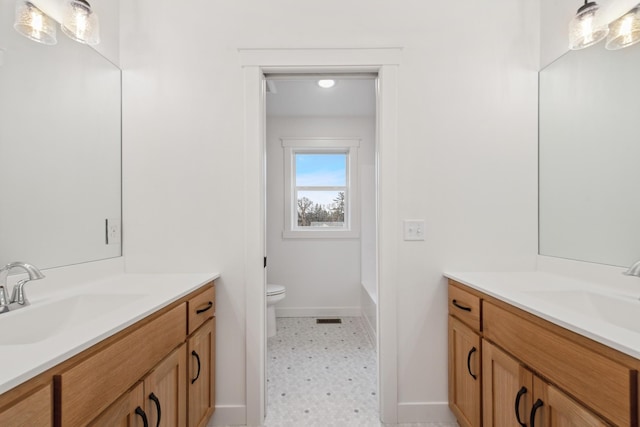 full bathroom featuring vanity, tile flooring, toilet, and bathing tub / shower combination