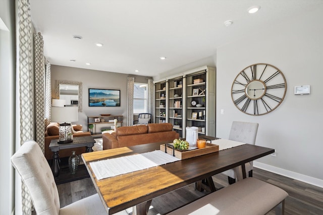 dining area featuring dark hardwood / wood-style flooring