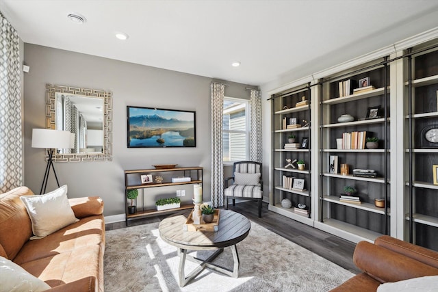 living room with dark hardwood / wood-style floors