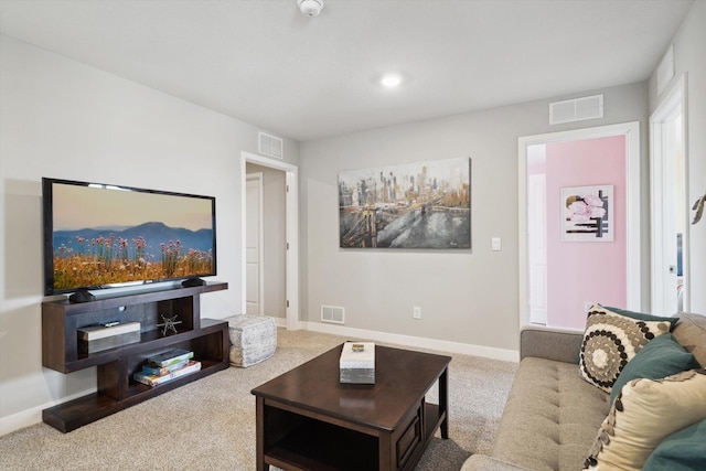 living room with light colored carpet