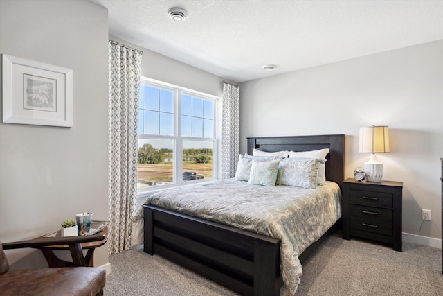 bedroom featuring light colored carpet