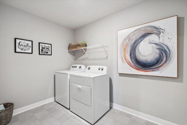 laundry area with washer and clothes dryer