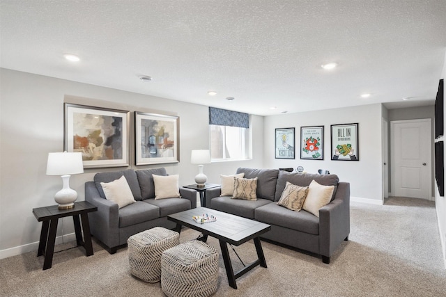 living room with light carpet and a textured ceiling