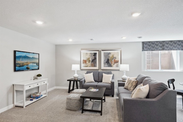 carpeted living room featuring a textured ceiling