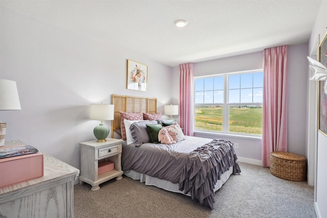 bedroom featuring light colored carpet